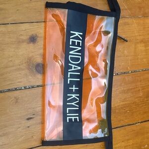 Kendall & Kylie Clear Orange Travel Pouch with Black Trim